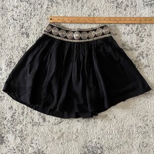 Gold detail mini skirt from Barcelona